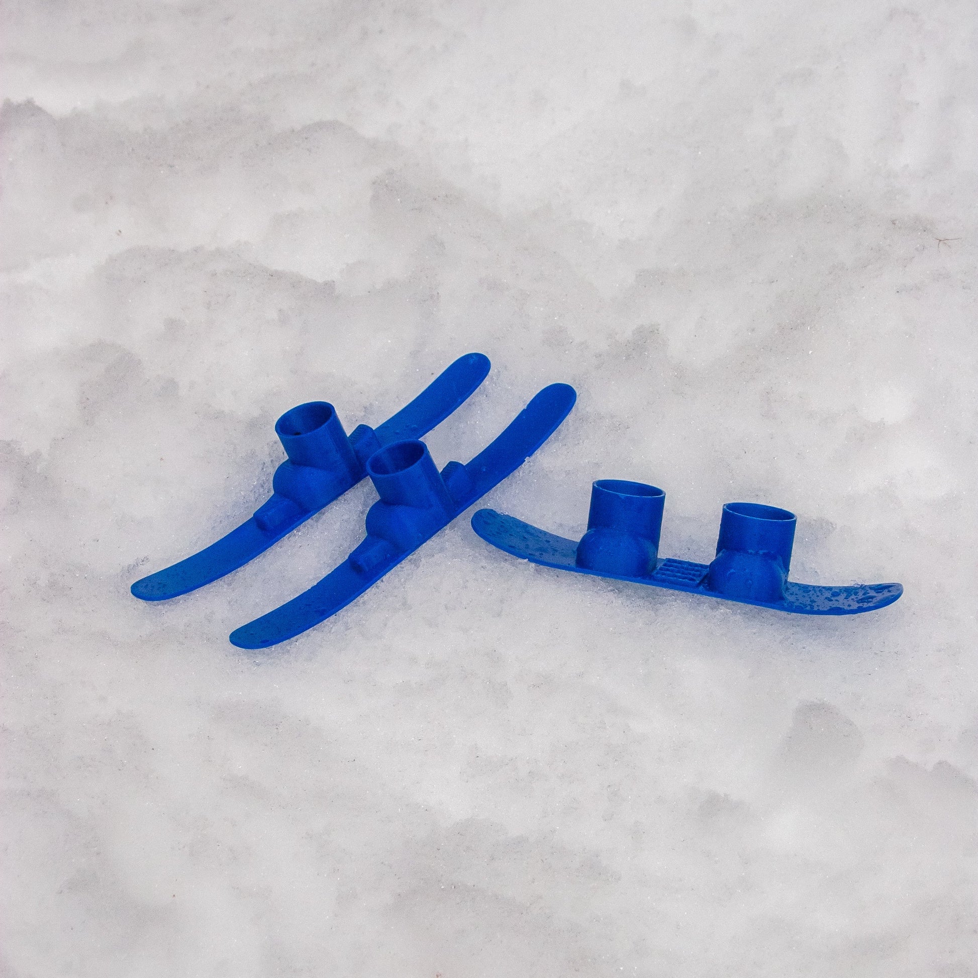 SlideofHand Finger Ski and Finger Snowboard blue with snowy background