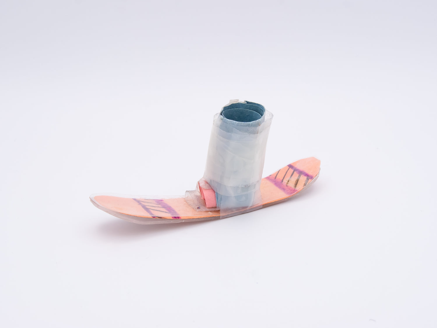 Small pink and orange finger ski on a white background