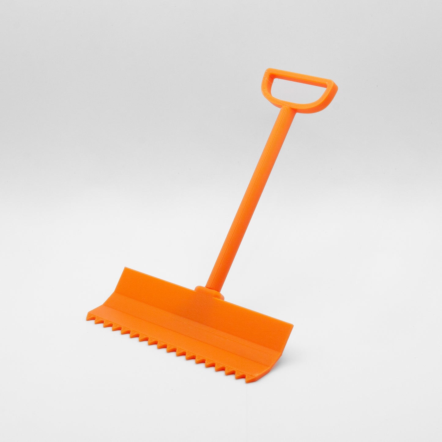 SlideofHand mini ski terrain park rake orange on white background