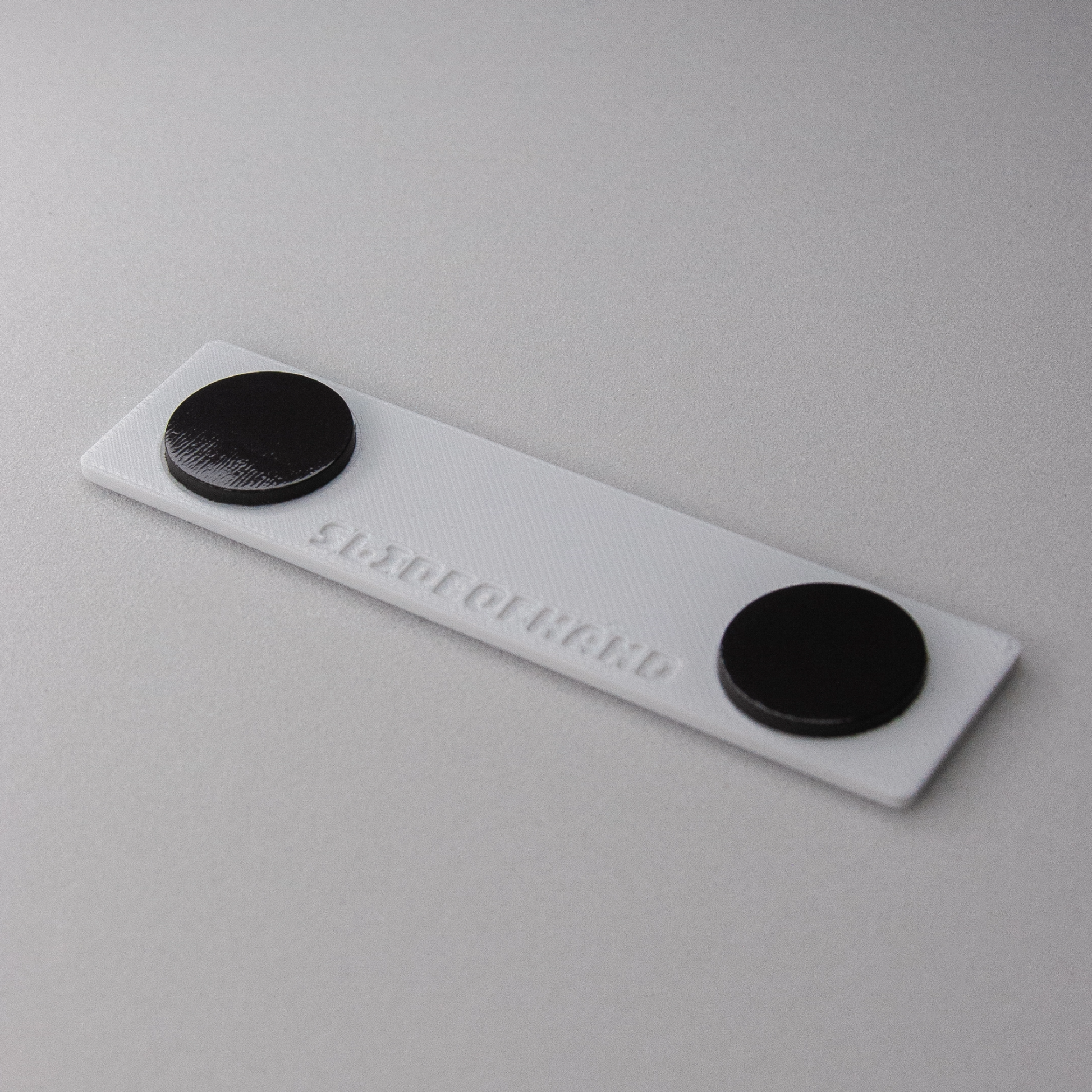 slideofhand miniature ski are sign backside showing magnet