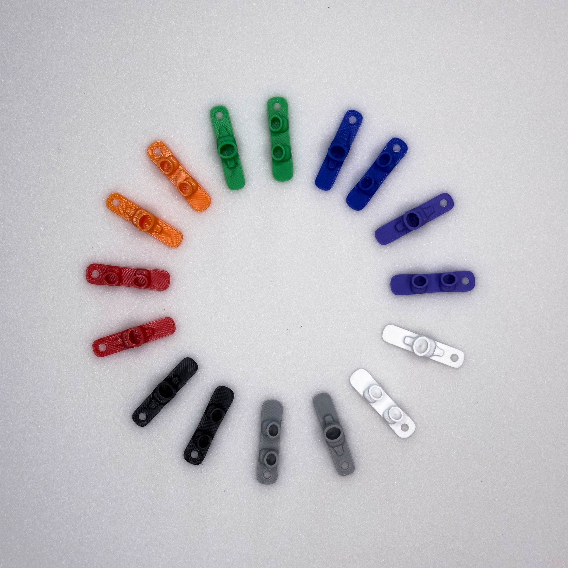 slideofhand ski and snowboard wine charms in assorted colors in a color circle