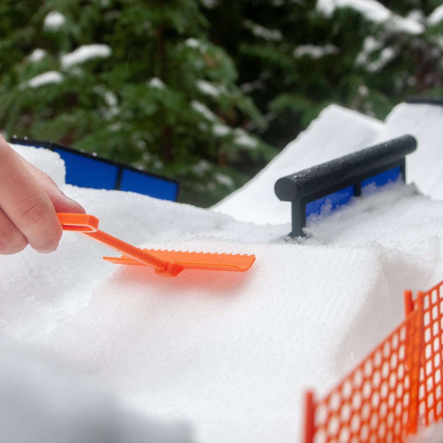 slideofhand finger ski terrain park rake and tube rail obstacle in snow