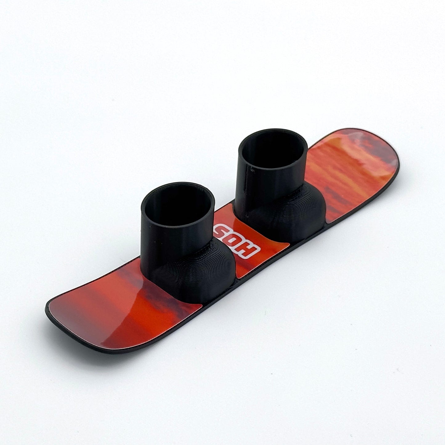 SlideofHand Finger Snowboard black with red sunrise graphic on a white