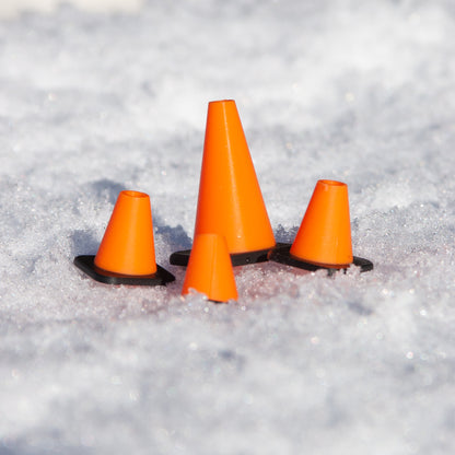 Slideofhand finger ski and snowboard cone accessory orange black in snow