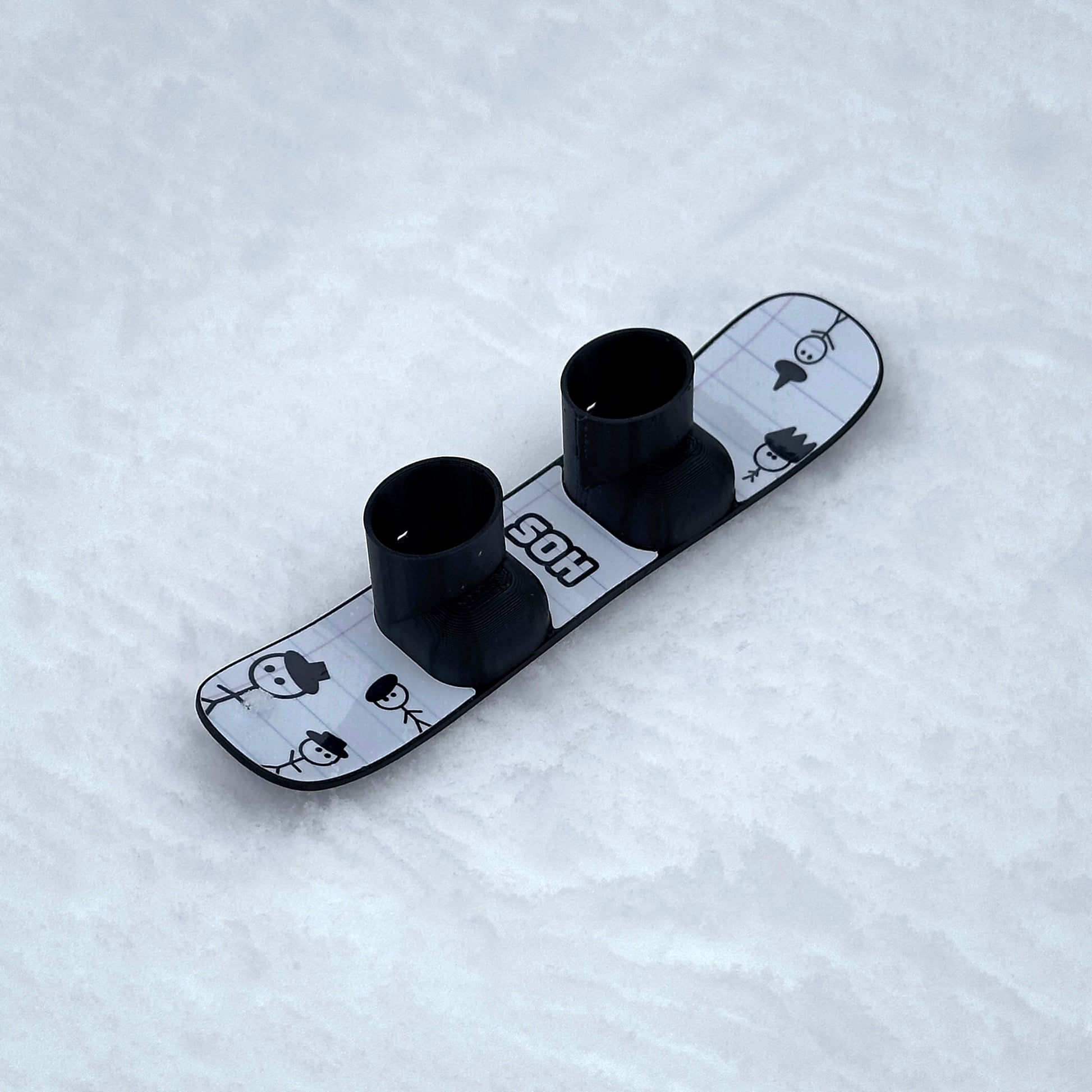 SlideofHand Finger snowboard doodle  Graphic top down sitting on snow