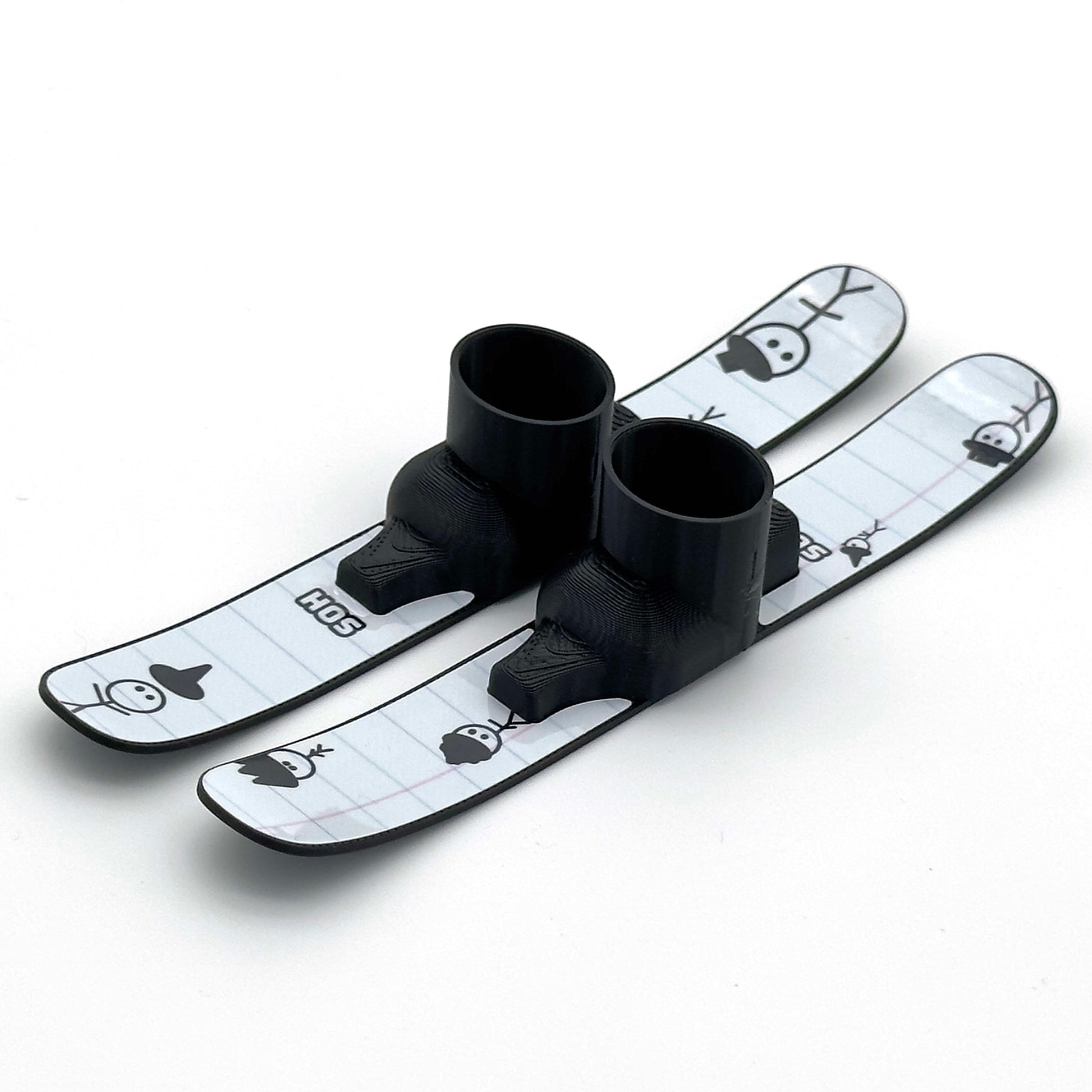 SlideofHand Finger Skis black with doodle hat people graphic on a white background