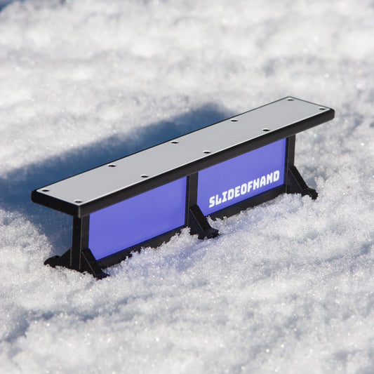 Slideofhand finger ski and snowboard terrrain park box rail accessory purple in snow