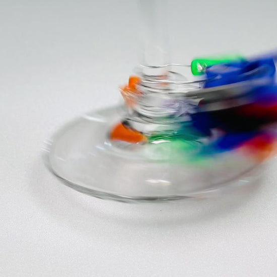 slideofhand ski and snowboard wine charms video spinning around a wine glass